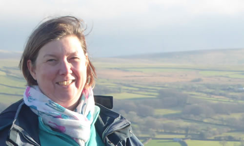 Laurel on Dartmoor with Roos Tor and Great Staple Tor in the background